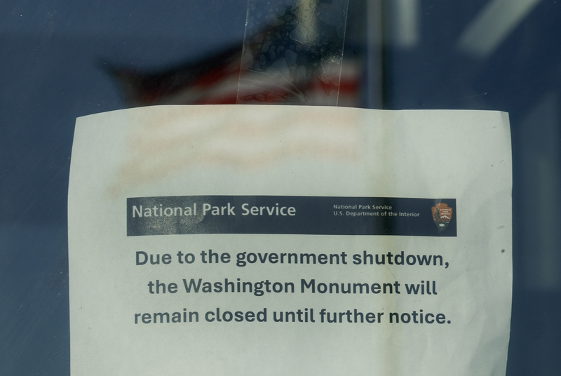 A closed sign is seen on the Washington Monument on Oct. 1, 2025 in Washington, D.C. The federal government shut down many operations overnight after Congress failed to pass a stopgap funding bill. (Photo by Kevin Dietsch/Getty Images)
