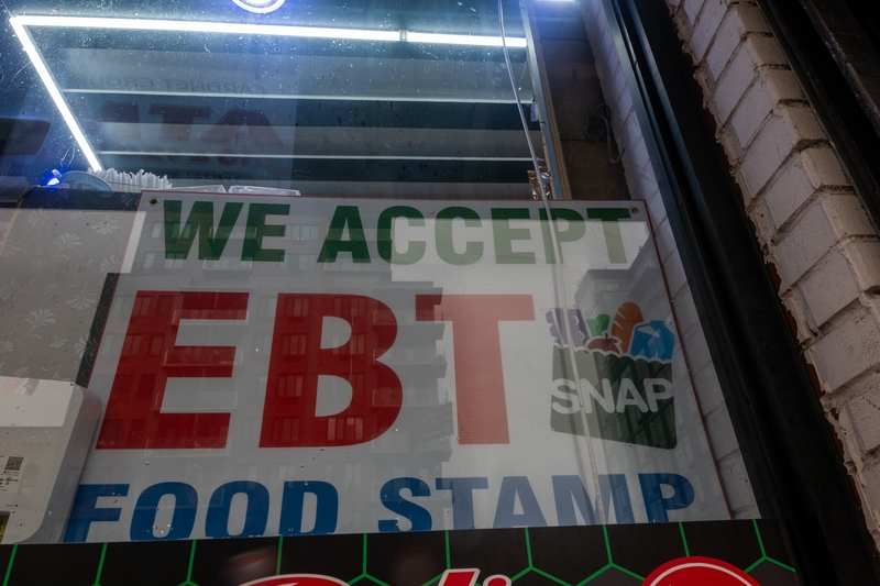 A store displays a sign accepting Electronic Benefits Transfer, or EBT, cards for Supplemental Nutrition Assistance Program purchases for groceries on Oct. 30, 2025 in New York City. (Photo by Spencer Platt/Getty Images)