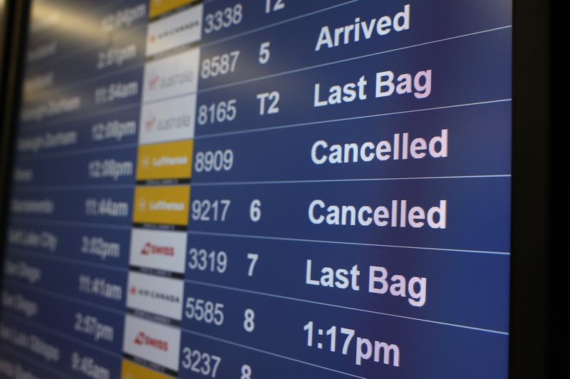 Canceled flights are displayed on an arrivals board at San Francisco International Airport  on Nov. 0, 2025 in San Francisco, California. (Photo by Justin Sullivan/Getty Images)