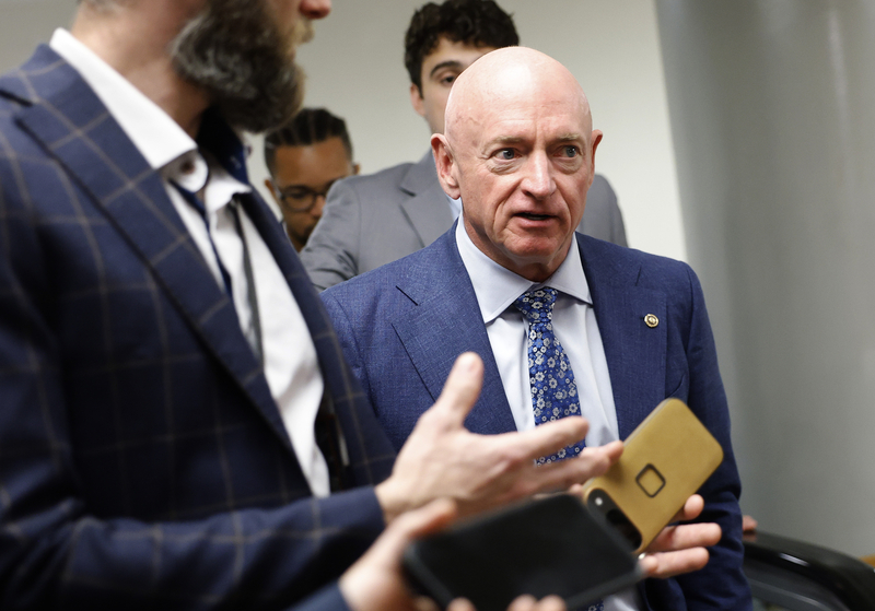 U.S. Sen. Mark Kelly, D-Ariz., speaks to reporters at the U.S. Capitol on March 25, 2025 in Washington, D.C. (Photo by Kevin Dietsch/Getty Images)