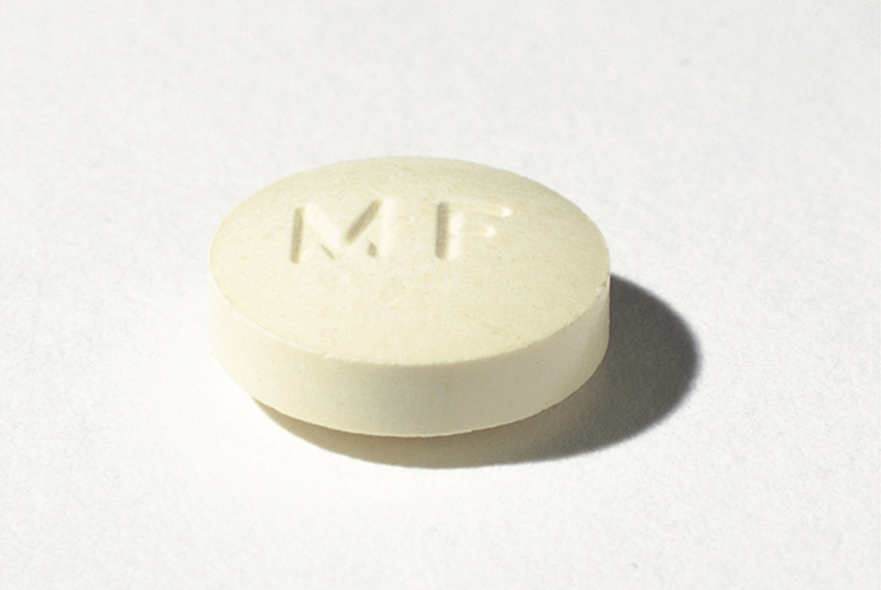 A closeup photo of a mifepristone pill