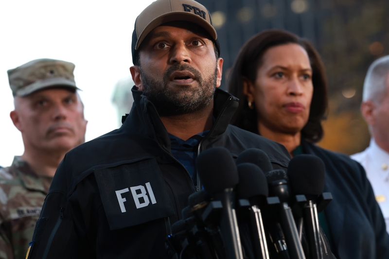 FBI Director Kash Patel speaks to reporters following the shooting of two National Guard soldiers in Washington, D.C., on Nov. 26, 2025. Mayor Muriel Bowser looks on. (Photo by Anna Moneymaker/Getty Image