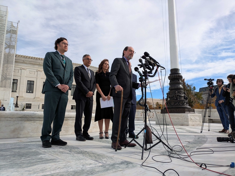 Victor Schwartz, founder and president of VOS Selections, spoke to reporters outside the U.S. Supreme Court on Wednesday, Nov. 5, 2025. Schwartz, a New York-based wine and spirits importer of 40 years, was the lead plaintiff in the case against President Donald Trump's sweeping emergency tariffs. (Photo by Ashley Murray/States Newsroom)