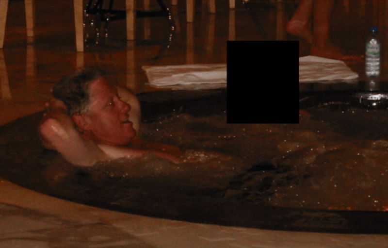 Former President Bill Clinton is seen in a hot tub or spa in an undated photo from the Epstein files released by the Department of Justice on Dec. 19, 2025. (Photo from Department of Justice)