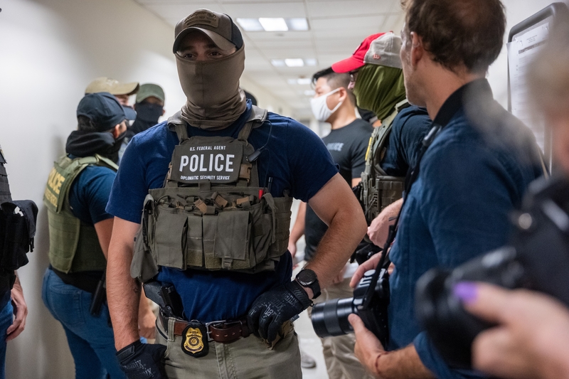 NEW YORK, NEW YORK - JULY 16: Federal agents patrol the halls of immigration court at the Jacob K. Javitz Federal Building on July 16, 2025, in New York City. Various council members and a state senator attended immigration hearings and observed Immigration and Customs Enforcement as they continued their stepped-up tactics of detaining people during routine check-ins or showing up to court for their immigration hearings. (Photo by Spencer Platt/Getty Images)