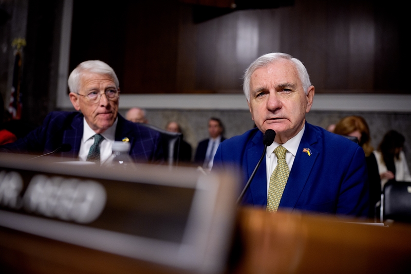Ranking Member Sen. Jack Reed (D-RI) (R), accompanied by Chairman Sen. Roger Wicker (R-MS), speaks as United States Northern Command and North American Aerospace Defense Command (USNORTHCOM) Commander Gen. Gregory Guillot, Principal Deputy Assistant Secretary of Defense for Homeland Defense and Americas Security Affairs Mark Ditlevson, and Department of War Principal Deputy General Counsel Charles Young III, appear at a Senate Committee on Armed Services hearing on Capitol Hill on December 11, 2025 in Washi