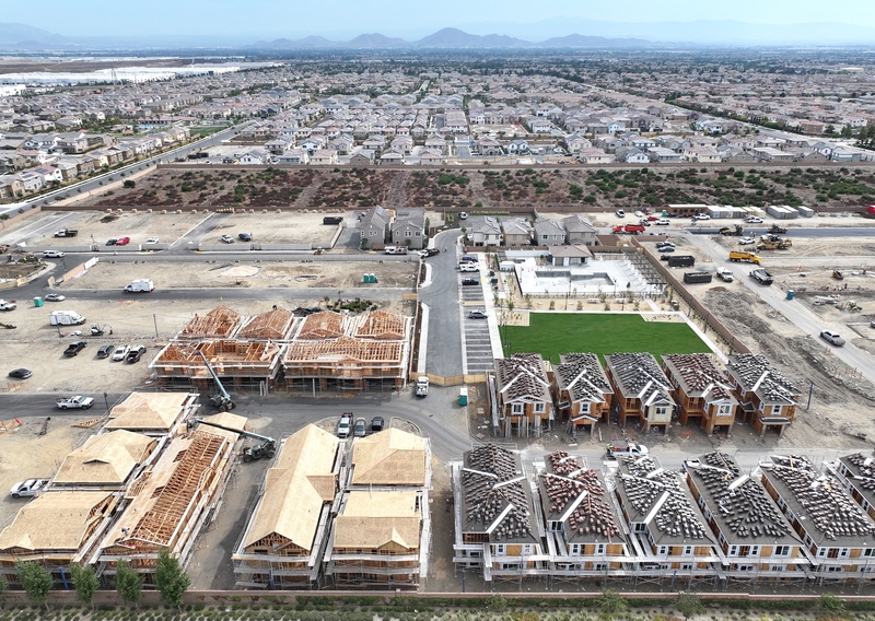 An aerial view of new residential housing under construction at a planned community on September 17, 2025 in Fontana, California. The 30-year fixed mortgage average rate dropped to 6.13 percent yesterday, the lowest mark since 2022, ahead of today’s Federal Reserve rate cut announcement. (Photo by Mario Tama/Getty Images)