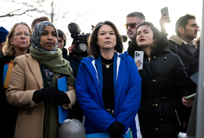 U.S. Rep. Ilhan Omar, D-Minn., left, and Rep. Angie Craig, D-Minn., stand outside the regional ICE headquarters at the Bishop Henry Whipple Federal Building on Jan. 10, 2026 in Minneapolis, Minnesota. The lawmakers attempted to access the facility where the Department of Homeland Security has been headquartering operations in the state. (Photo by Stephen Maturen/Getty Images)