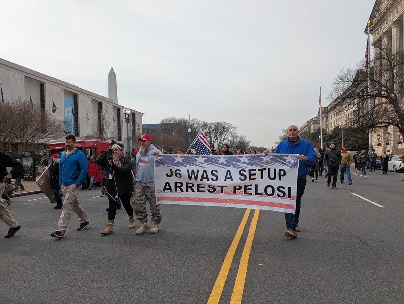 A small crowd of far-right activists marched down Constitution Avenue on Tuesday, Jan. 6, 2026, following the path of the march five years ago when rioters attacked the U.S. Capitol in an attempt to stop the certification of Joe Biden's presidential election win. (Ashley Murray/States Newsroom)