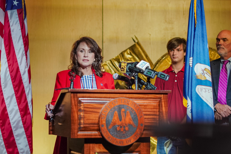 Republican Louisiana Attorney General Liz Murrill stands behind a podium