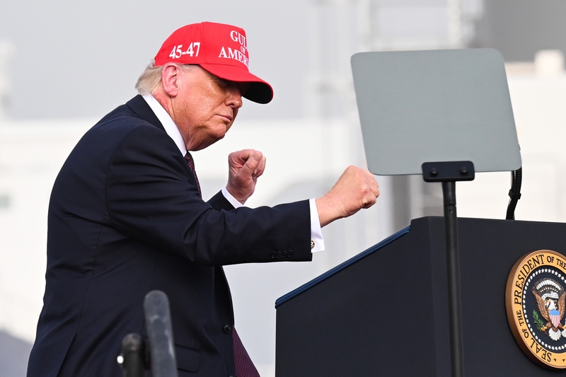 President Donald Trump dances as he departs after speaking at the Port of Corpus Christi on Feb. 27, 2026 in Corpus Christi, Texas. Trump visited Texas to deliver remarks on affordability and economic issues days before the state's midterm primary elections on March 3. (Photo by Roberto Schmidt/Getty Images)