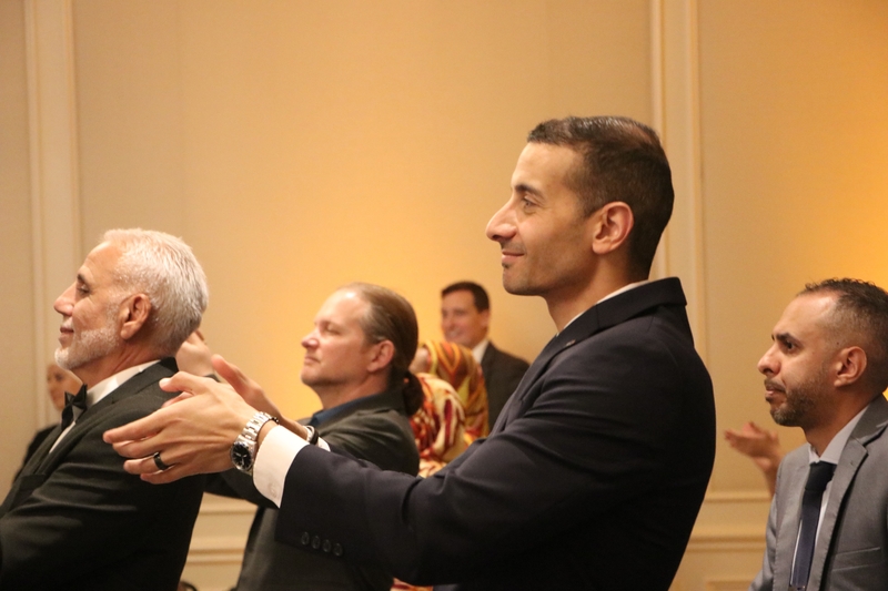 Alexandria, Virginia, Councilman Abdel Elnoubi applauds at National Arab American Heritage Month Signature Celebration on Thursday, April 16, 2026. (Photo by Jacques Abou-Rizk/Medill News Service)