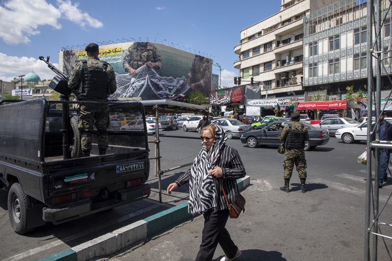Armed police patrol as Iranians gather in Tehran's Revolution Square after the United States and Iran agreed to a two-week ceasefire, on April 8, 2026 in Tehran, Iran. (Photo by Majid Saeedi/Getty Images)