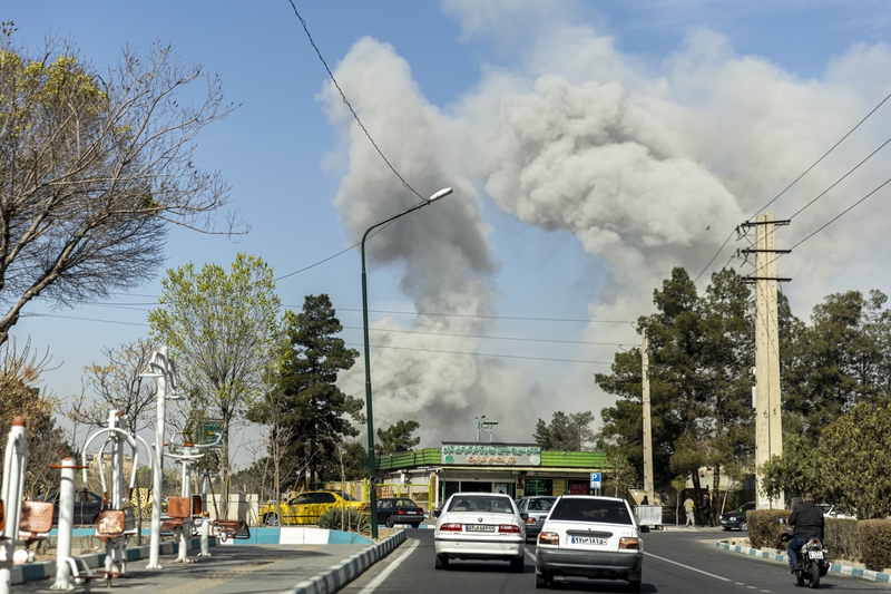 Plumes of smoke rise following an explosion on March 5, 2026 in Tehran, Iran. (Photo by Majid Saeedi/Getty Images)