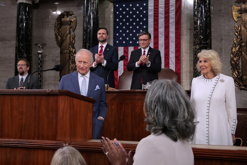 U.S. Vice President JD Vance and U.S. House Speaker Mike Johnson, R-La., applaud as Britain's King Charles III and and Queen Camilla arrive before he addresses a Joint Meeting of Congress at the U.S. Capitol on April 28, 2026 in Washington, D.C. (Photo by Kylie Cooper-Pool/Getty Images)