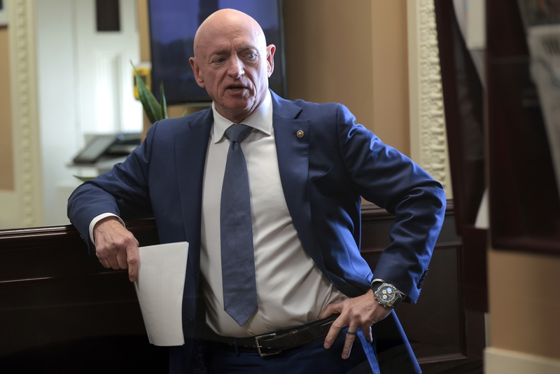 U.S. Sen. Mark Kelly, D-Ariz., speaks at a news conference at the U.S. Capitol on Feb. 11, 2026 in Washington, D.C. (Photo by Heather Diehl/Getty Images)