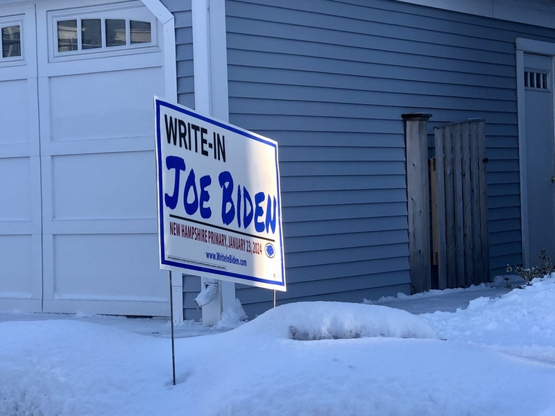 A “Write-In Joe Biden” campaign sign in a Portsmouth, New Hampshire, snow bank in 2024, when New Hampshire held its primary first in the nation in defiance of the Democratic National Committee. (Photo by Hadley Barndollar/New Hampshire Bulletin)