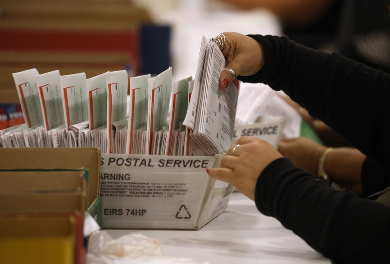 An election worker processes mail-in ballots for the June 2, 2026 California state primary election at the Los Angeles County Ballot Processing Center on June 5, 2026 in City of Industry, California. (Photo by Justin Sullivan/Getty Images)