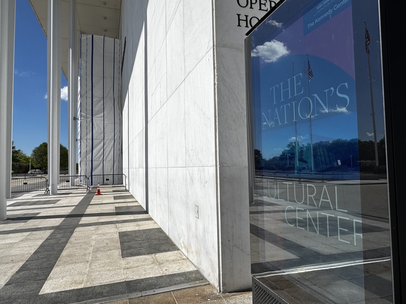 A weatherproof tarp is affixed to the facade of the John F. Kennedy Center for the Performing Arts in Washington, D.C., on June 15, 2026. (Photo by Sam Gauntt/States Newsroom)