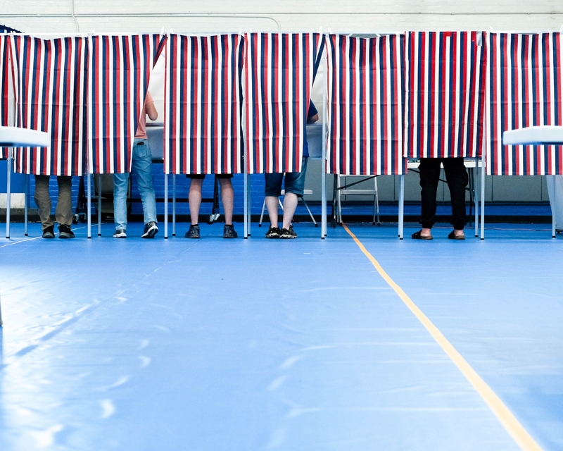 Open Democracy, a New Hampshire voting rights group, has spent several years working to improve the registration rate among 18-year-olds. Shown are New Hampshire voters. (Photo by Will Steinfeld/New Hampshire Bulletin)