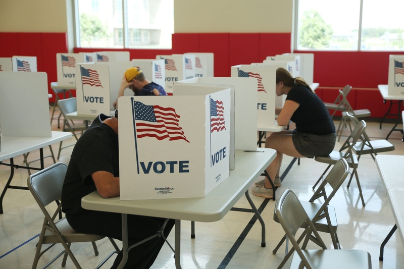Voters fill out their ballots at a Sioux Falls polling place during the South Dakota primary election on June 2, 2026. (Photo by Makenzie Huber/South Dakota Searchlight)