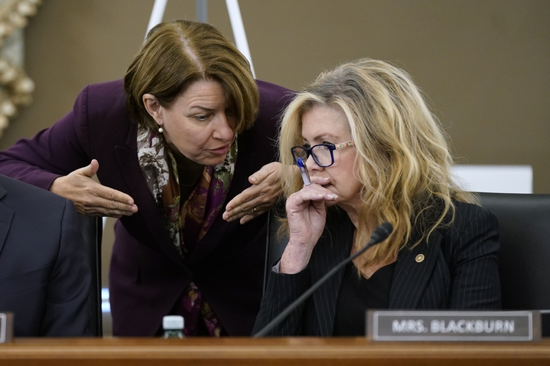 Sen. Amy Klobuchar, D-Minn., left, and Sen. Marsha Blackburn, R-Tenn., are among the record number of women running for governor this year. In this photo, they speak during a Senate subcommittee hearing on Capitol Hill on Sept. 30, 2021 in Washington, DC. (Photo by Patrick Semansky-Pool/Getty Images)