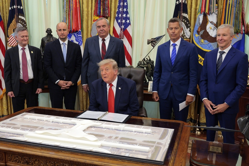 resident Donald Trump is joined by (L-R) Deputy Secretary of Transportation Steven G. Bradbury, MWAA board member Trent Morse, MWAA CEO Jack Potter, U.S. Secretary of Transportation Sean Duffy, and United Airlines CEO Scott Kirby during an announcement to renovate Washington Dulles International Airport, in the Oval Office of the White House on July 29, 2026 in Washington, DC. The Department of Transportation plans to unveil a $22 billion plan to rebuild the federally owned airport that will include an unde