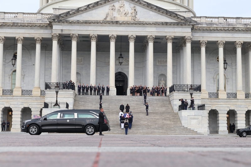 The flag-draped casket of the late Sen. Lindsey Graham, R-S.C., is carried into the U.S. Capitol on July 28, 2026. (Photo by Sam Gauntt/States Newsroom)