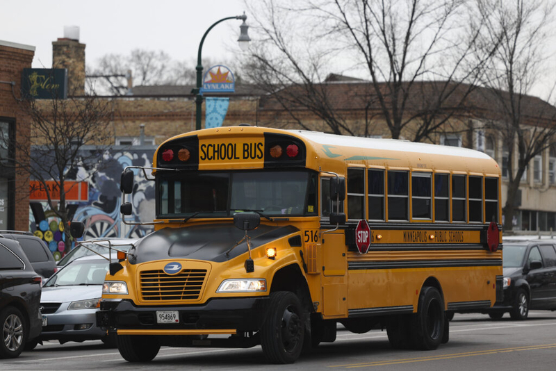 A school bus stops at the intersection of West Lake Street and South Lyndale Avenue on Thursday, Jan. 9, 2025, in Minneapolis, Minn. (Ellen Schmidt/Minnesota Reformer)