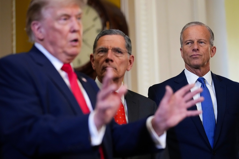 President Donald Trump speaks to the media as Senate Majority Whip John Barrasso, R-Wyo., and Senate Majority Leader John Thune, R-S.D., look on after a meeting at the U.S. Capitol on June 24, 2026 in Washington, D.C. (Photo by Andrew Harnik/Getty Images)