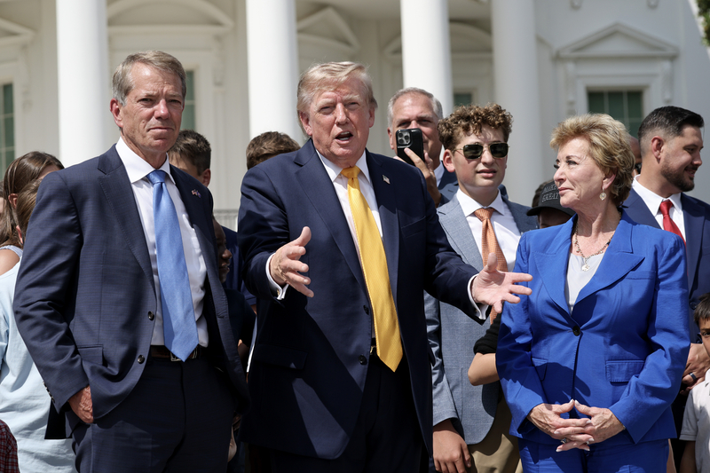 President Donald Trump and Secretary of Education Linda McMahon show off the White House helipad construction on the South Lawn of the White House after an event in the Rose Garden of the White House on August 24, 2026 in Washington, DC. The multimillion-dollar granite helipad is designed to accommodate Marine One helicopters and is slated for completion in 2026. (Photo by Win McNamee/Getty Images)