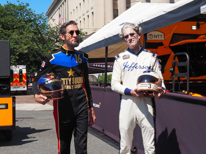 actors with Fox Sports network played Abraham Lincoln and Thomas Jefferson as race car drivers at the NTT IndyCar Series Freedom 250 Grand Prix in Washington, D.C., on Sunday, Aug. 23, 2026. (Photo by Ashley Murray/States Newsroom)