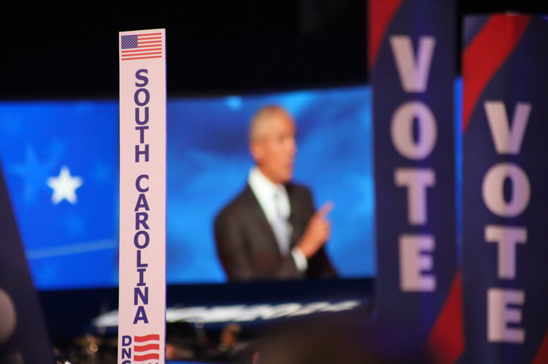 Former President Barack Obama speaks at the Democratic National Convention in 2024. (Photo by Shaun Griswold / Source New Mexico)