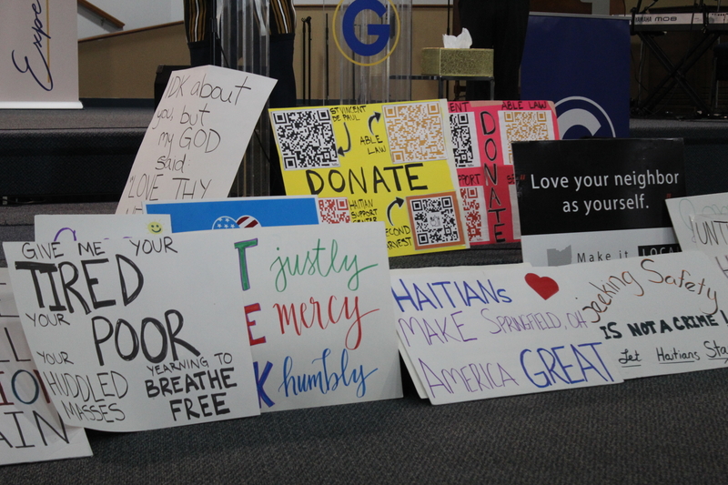 Signs of support for Haitians in Springfield, Ohio, after temporary protected status for Haitians.