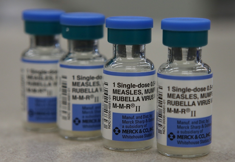 Vials of measles, mumps and rubella vaccine are displayed on a counter at a Walgreens Pharmacy on Jan. 26, 2015 in Mill Valley, California.  (Photo by Illustration Justin Sullivan/Getty Images)