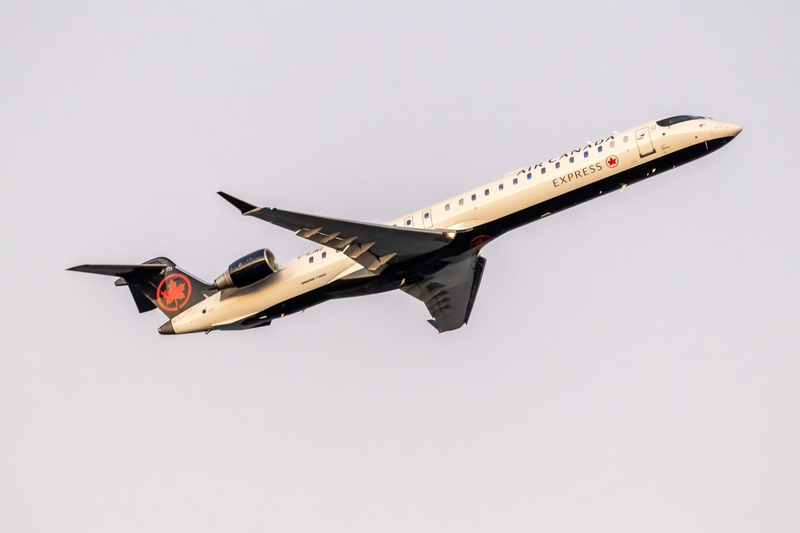 President Donald Trump has targeted Canadian airline manufacturer Bombardier in his trade war with Canada. In this photo, an Air Canada Express Bombardier CRJ900 aircraft departs Ronald Reagan Washington National Airport. (Photo by Getty Images/Yassine Bahammou)
