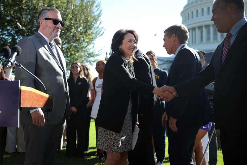 WASHINGTON, DC - SEPTEMBER 14: U.S. Senate Committee on Commerce, Science &amp; Transportation Chairman Ted Cruz (R-TX) (L) and ranking member Sen. Maria Cantwell (D-WA) welcome Gonzaga men's basketball Coach Mark Few and University of Houston men's basketball Coach Kelvin Sampson (R) before a news conference with NCAA athletes and coaches about the Protect College Sports Act on September 14, 2026 in Washington, DC. The bill will set rules for college athlete "Name Image and Likeness," revenue share cap, transf