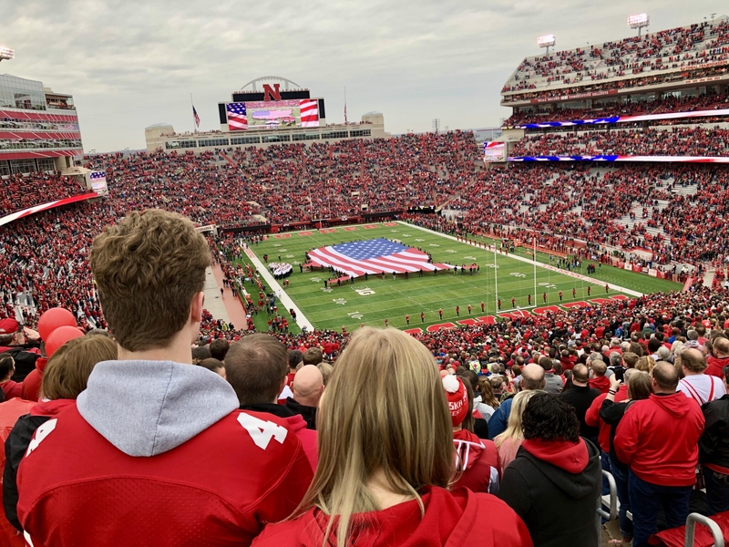 Fans cheer on the University of Nebraska Cornhuskers at Memorial Stadium in Lincoln, Nebraska. (Photo by Aaron Sanderford/Nebraska Examiner)