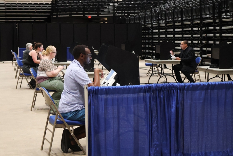 Voters fill out ballots using touch screens during early voting at the Bismarck Event Center in Bismarck, North Dakota, on June 8, 2026. (Photo by Michael Achterling/North Dakota Monitor)