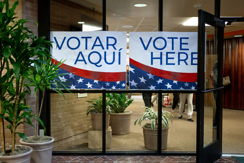 Signs in English and Spanish direct voters to the polls at the Salt Lake County Government Center in Salt Lake City on Election Day, Tuesday, Nov. 5, 2024. (Photo by Spenser Heaps for Utah News Dispatch)
