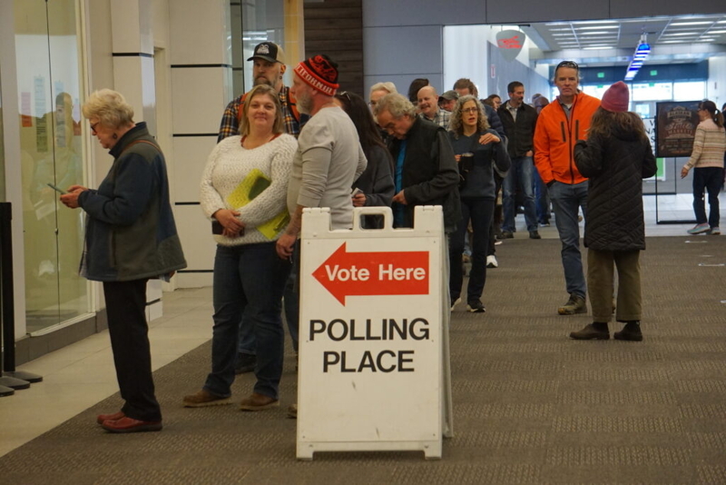 Early voters line up at the Midtown Mall in Anchorage on Thursday, Oct. 22, 2026. (Yereth Rosen photo/Alaska Beacon)