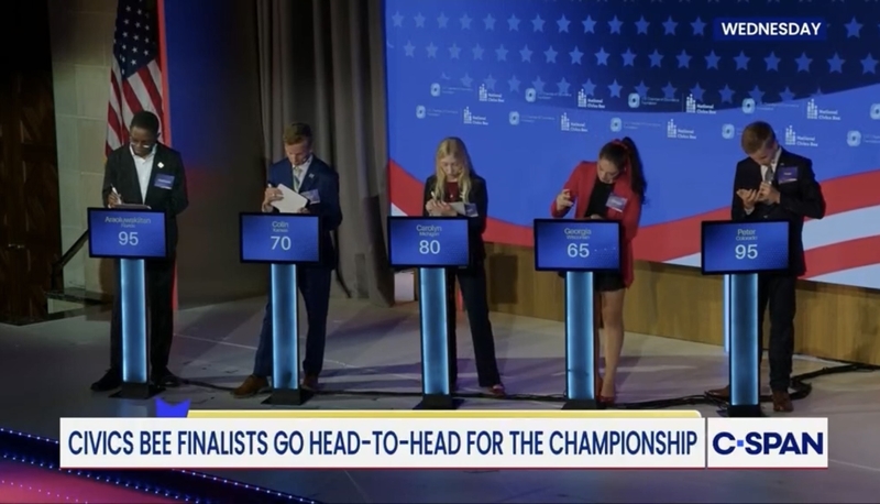 Finalists in the National Civics Bee championship on Oct. 14, 2026, work on their answers to a question about gerrymandering. (Screenshot courtesy of C-SPAN)