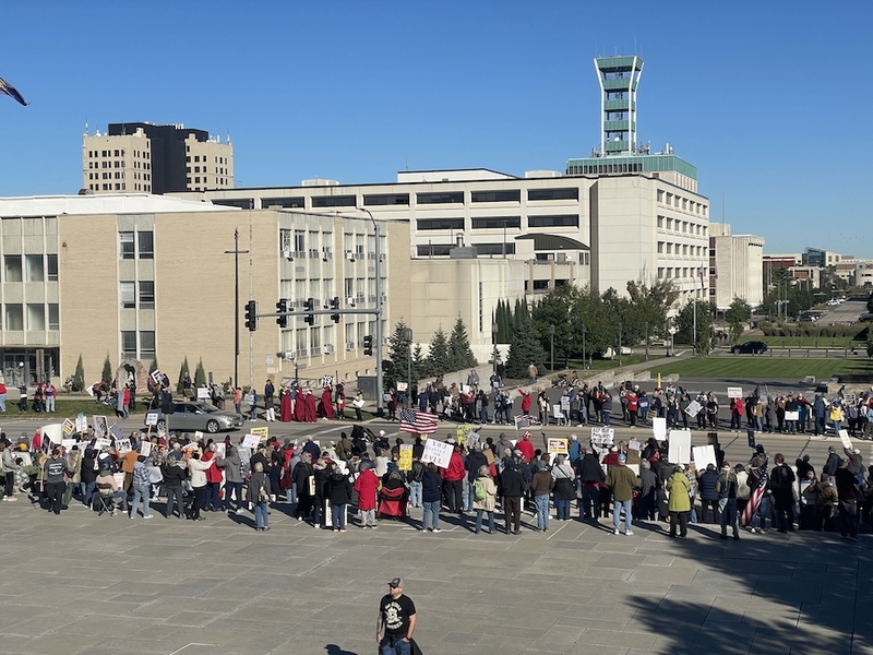 Crowds gather near the Nebraska State Capitol in Lincoln for a No Kings event to urge early voting in the midterms on Saturday, Oct. 17, 2026. (Photo by Juan Salinas II/Nebraska Examiner)
