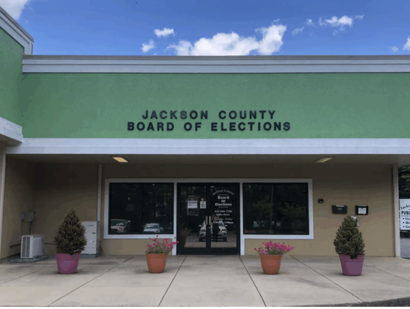 A GOP county elections board member said he was warned against voting for a campus polling site