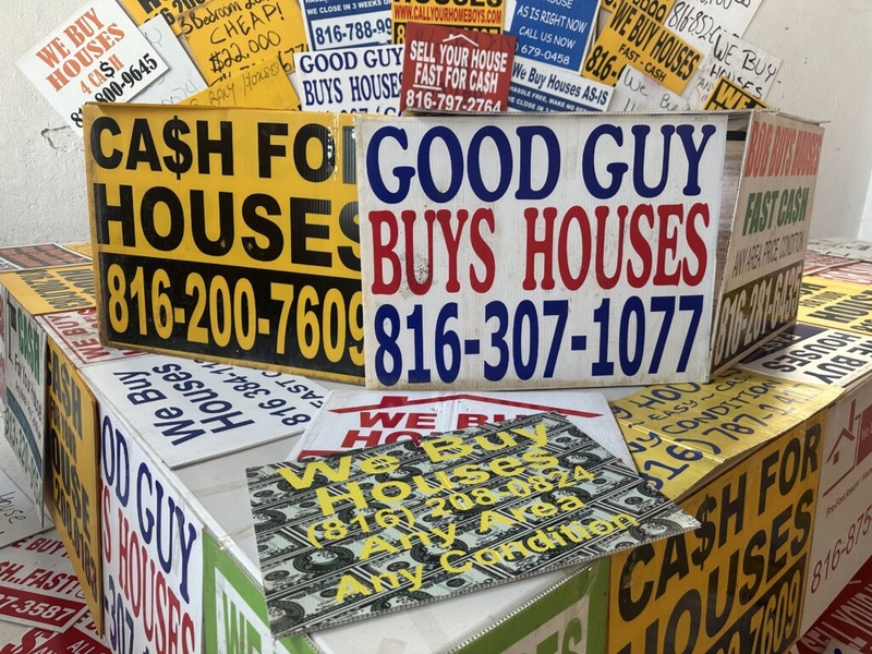 The signs offer quick cash for homes. But states want more oversight.