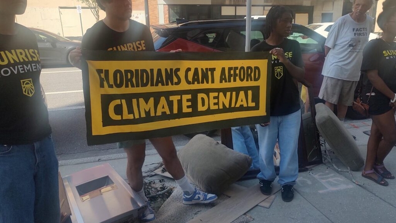 Sunrise Movement activists protest at Rick Scott&amp;rsquo;s district office in Tampa