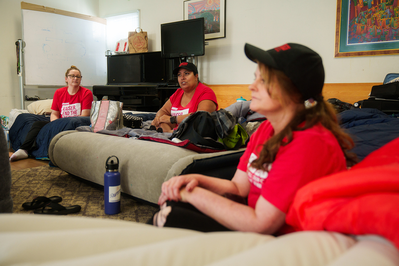 A Kaiser strike by mental health workers drags on — setting a US record — as talks resume
