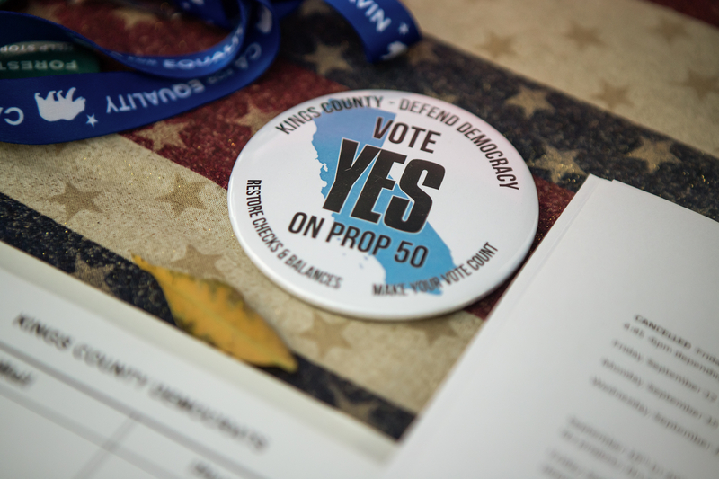 Supporters are way ahead in fundraising for Newsom’s Prop. 50, but the race remains close