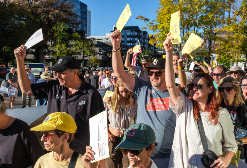 In Salt Lake City, No Kings marchers carry ballots to drop boxes