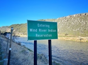 A sign along the Wind River Canyon marks travelers' entrance to the Wind River Indian Reservation. (Katie Klingsporn/WyoFile)